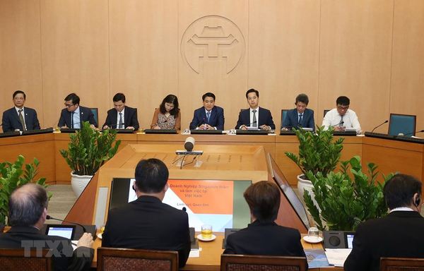 Khuyến khích doanh nghiệp Singapore đầu tư vào Hà Nội